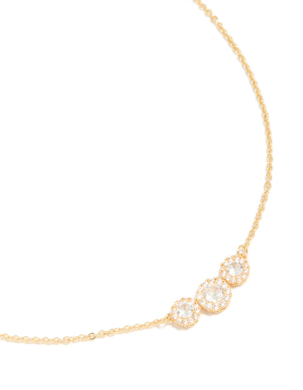This gold plated cubic zirconia featuring trio halo stone cut necklace close up view