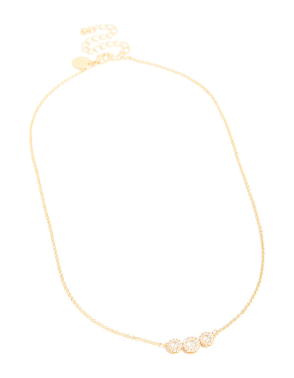 Designed with cubic zirconia halo stone cut, this gold plated trio necklace front view
