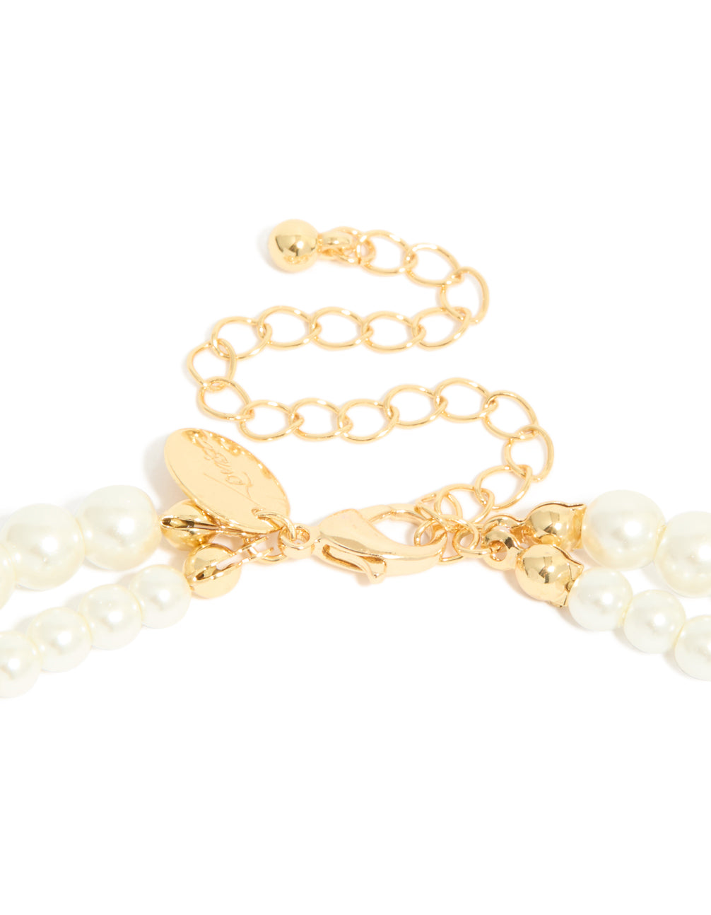 This gold plated cubic zirconia and pearl drop layered necklace clasp detail view