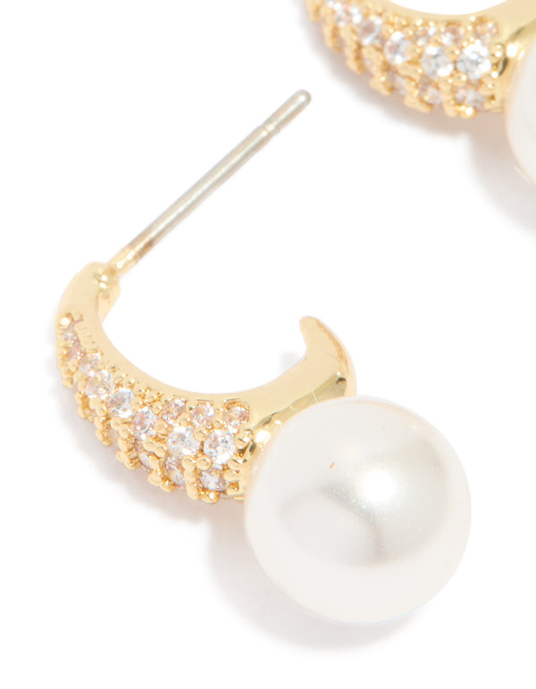 Highlighting gold plated cubic zirconia and pearl small pave open hoop earrings close up view