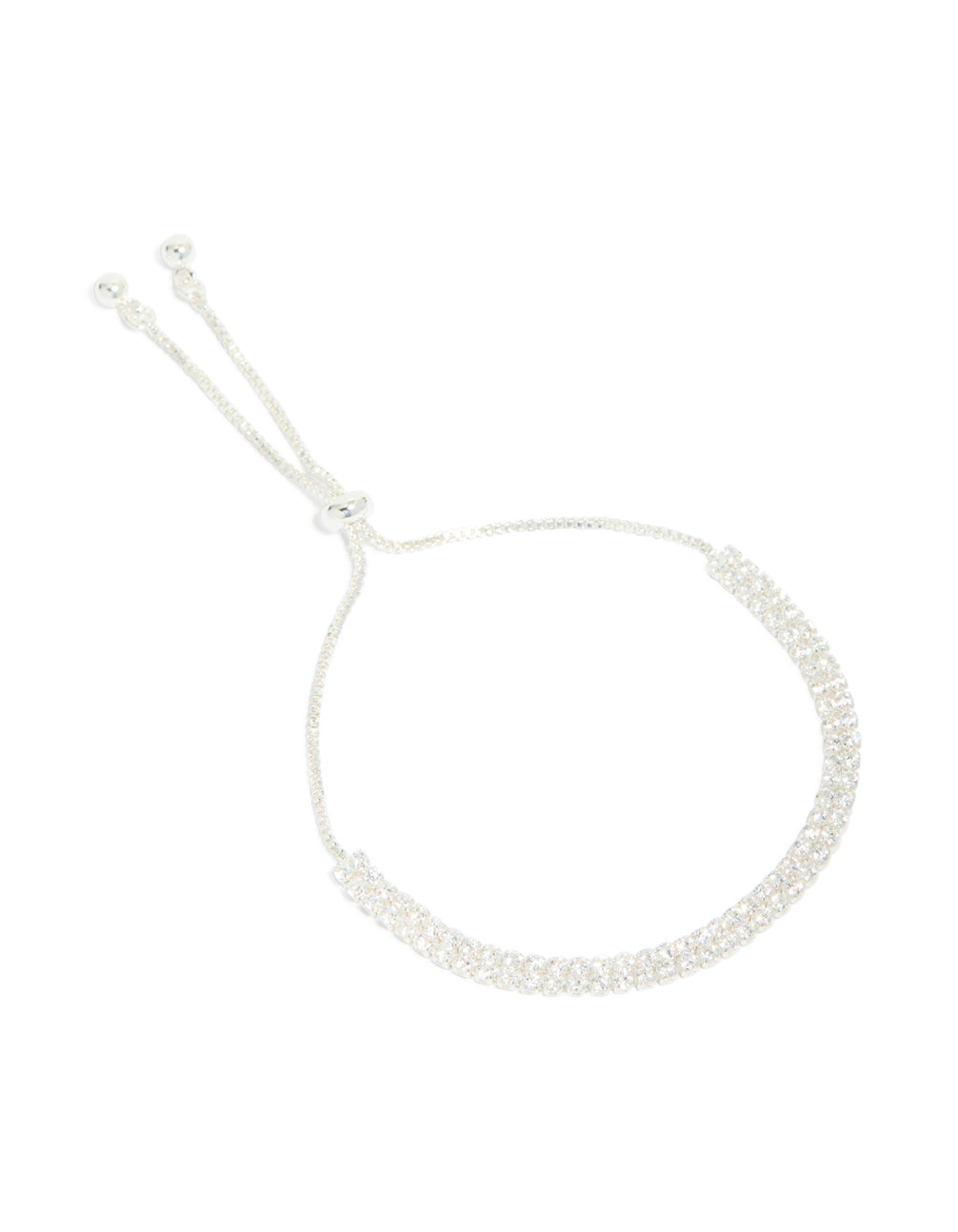 Featuring a silver plated cubic zirconia thin tennis layered toggle bracelet front view