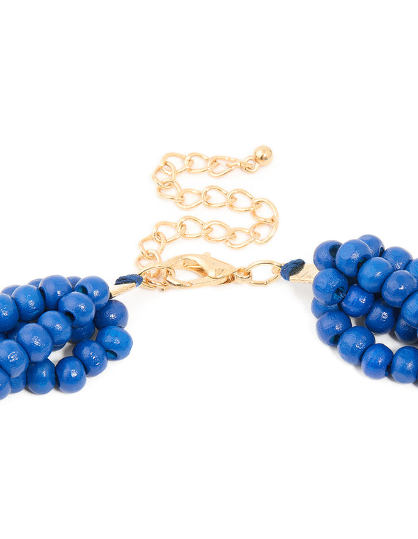 Shop dark blue acrylic beaded long layered necklace with royal statement in gold clasp detail view