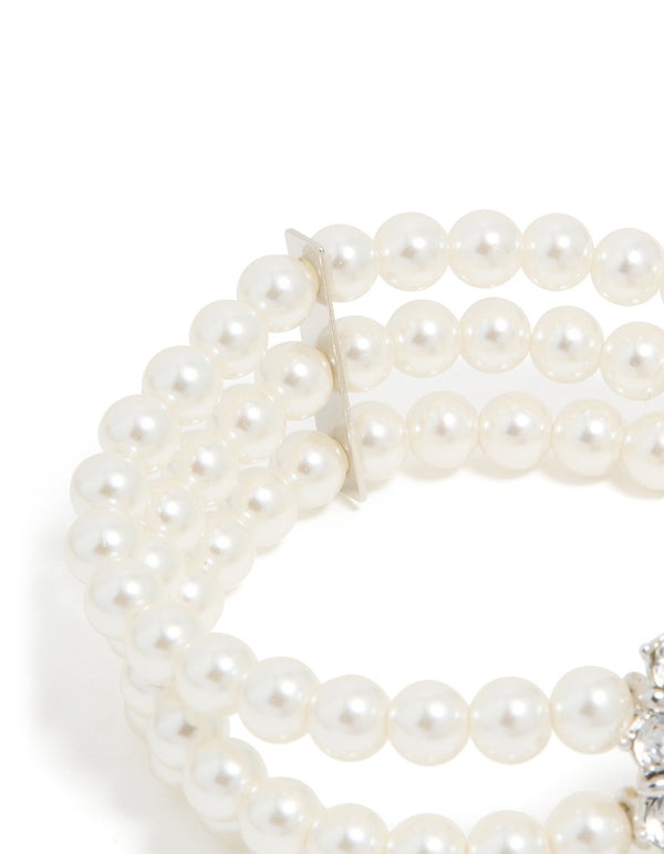 Beautiful silver diamante and pearl layered bracelet in closure detail view