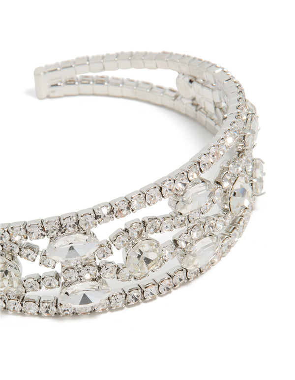 Highlighting the silver diamantes fancy wrist cuff bangle with intricate detailing in close up view