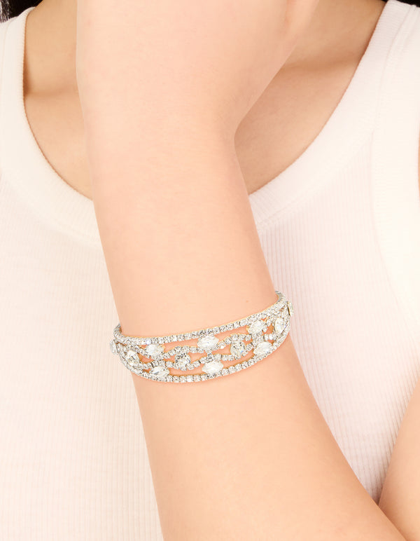 Showcasing a silver diamantes fancy wrist cuff bangle on wrist view