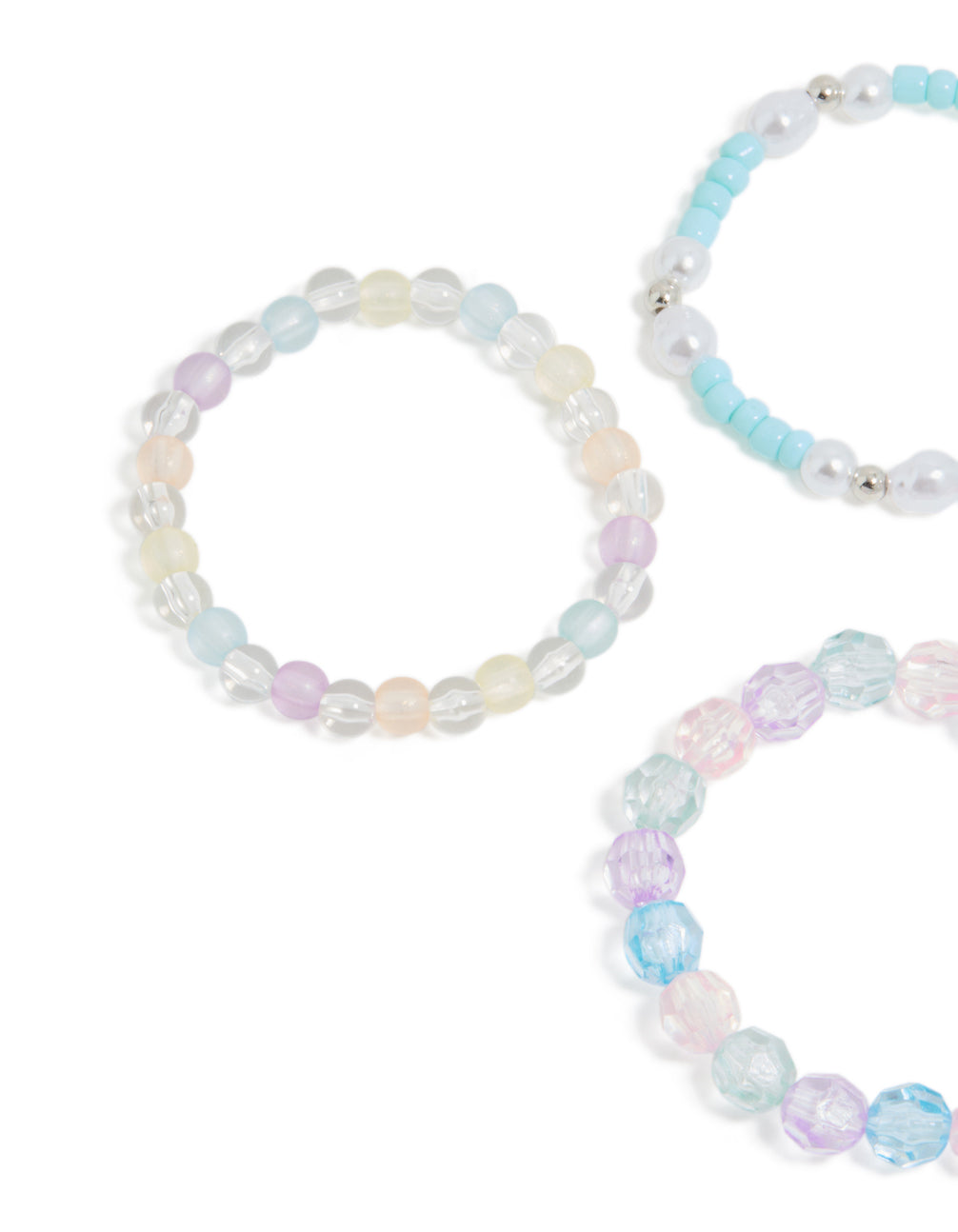 Featuring kids beaded pearl shell stretch bracelets in white light blue lavender and silver with ocean close up view