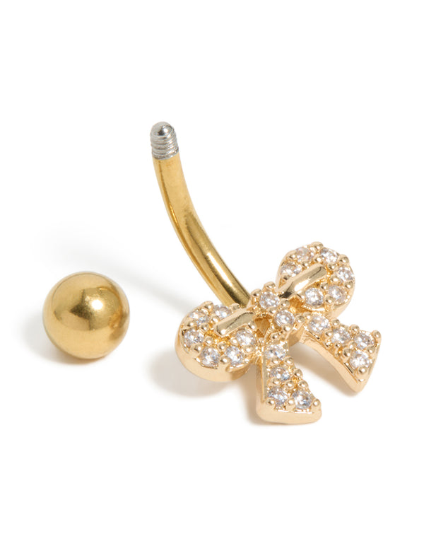 Featuring a bow belly bar with cubic zirconia pavé, crafted from gold plated surgical steel detail view