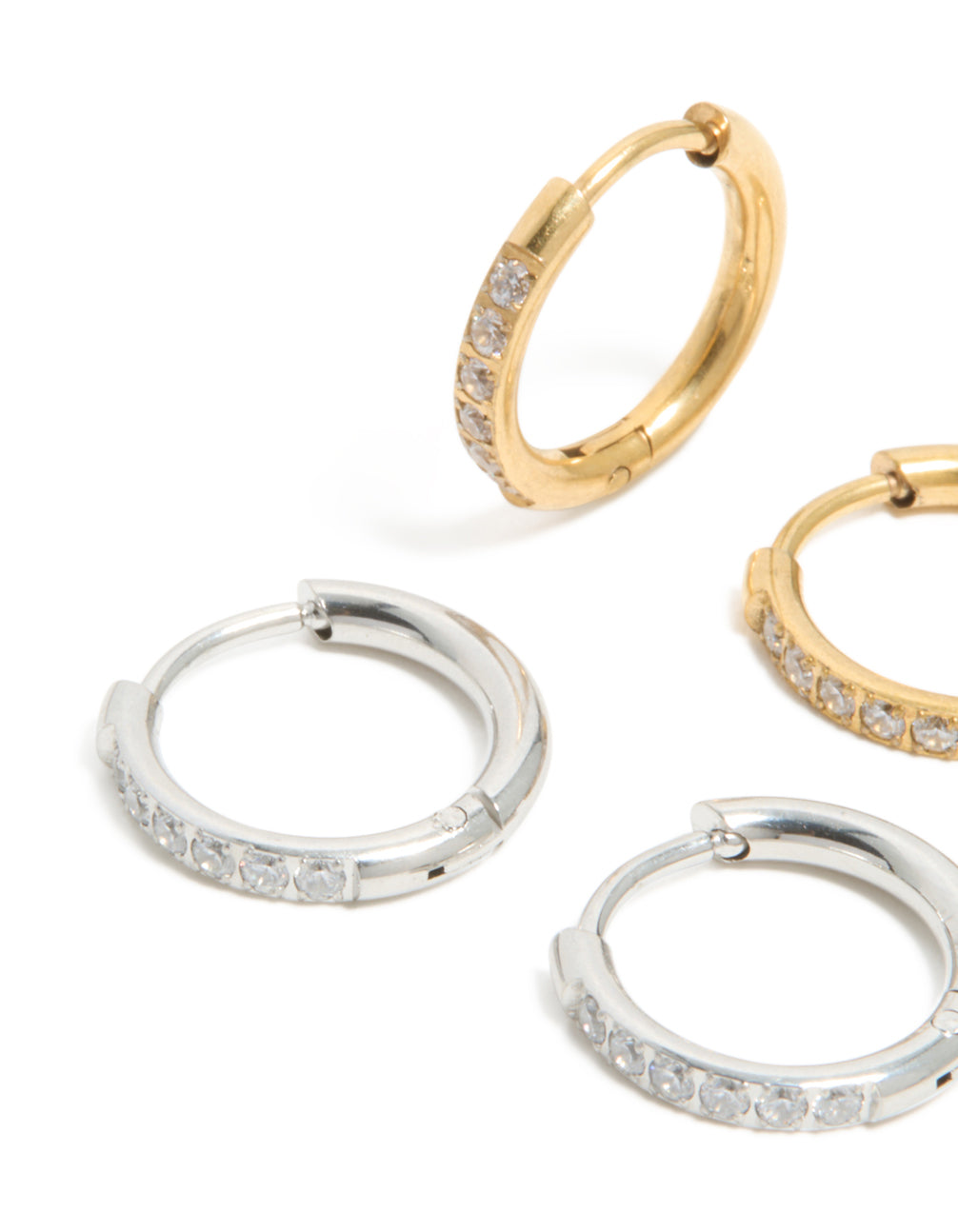 Close view of waterproof thin pavé huggie earrings 2-pack with stainless steel, cubic zirconia stones, and gold plated in silver and gold close up view