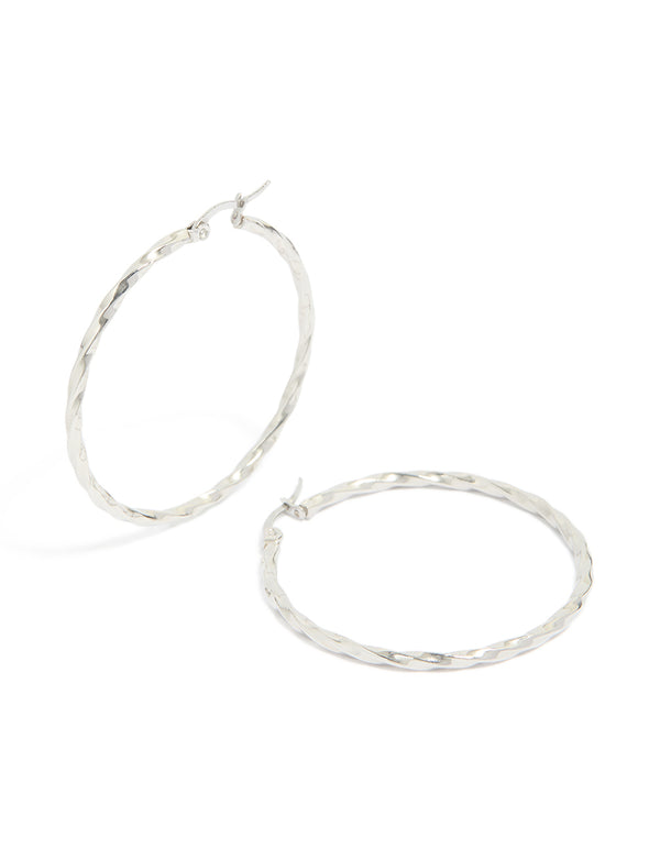 Featuring textured surgical steel hoop earrings in silver 40 MM front view