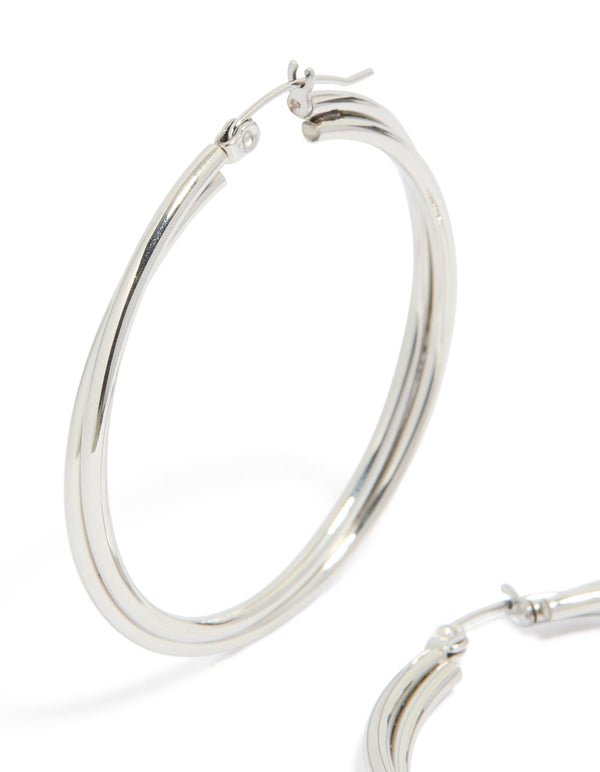 Designed with surgical steel crossover hoop earrings in silver 40 MM post detail view