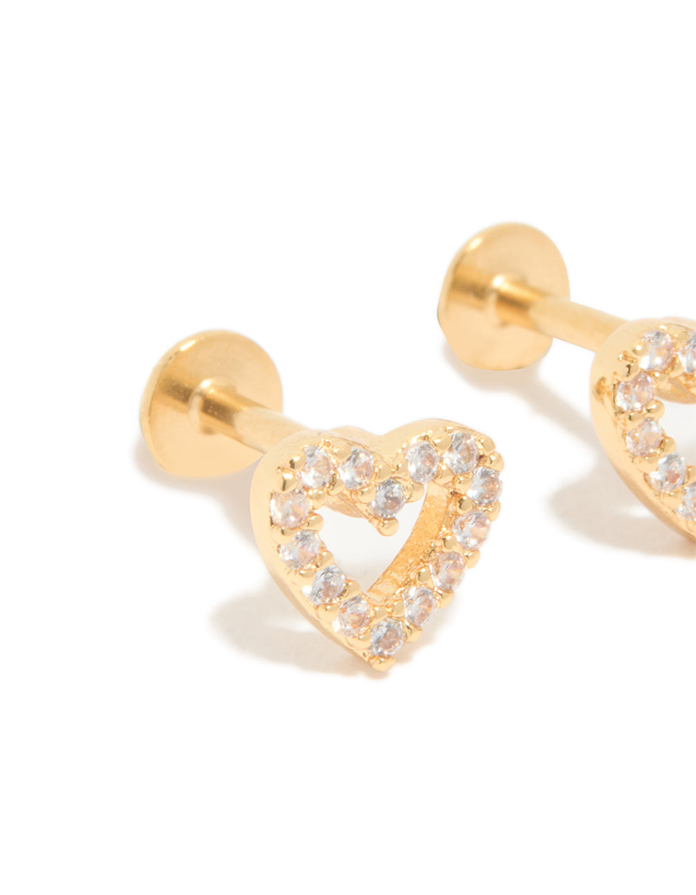 Featuring an open heart design, these gold plated titanium flat back studs with cubic zirconia are shown in a close up view