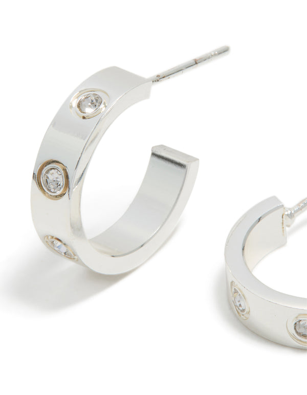 Featuring waterproof stainless steel square cubic zirconia hoop earrings in silver close up view