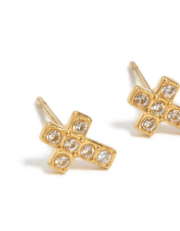 Highlighting waterproof gold plated stainless steel cross stud earrings with cubic zirconia in statement style close up view