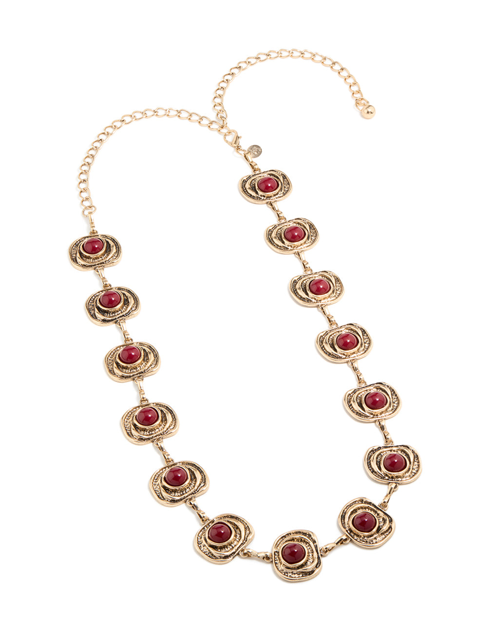 Showcasing an antique gold organic circle belt featuring dark red stones and an embellished pattern in a bold statement style front view