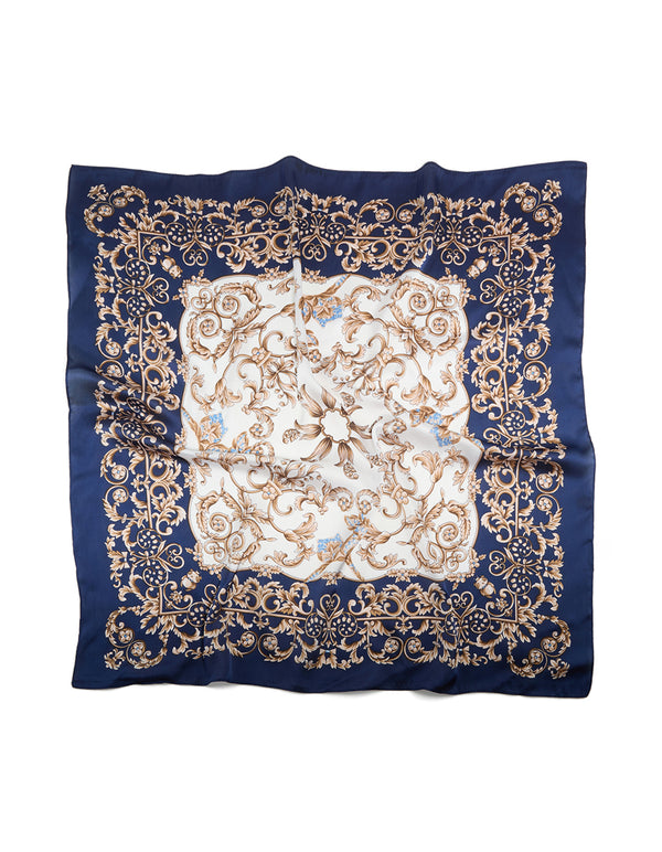 Showcasing a dark blue and white baroque flower polyester fabric scarf featuring leaf and floral patterns in navy, tan, and gold front view