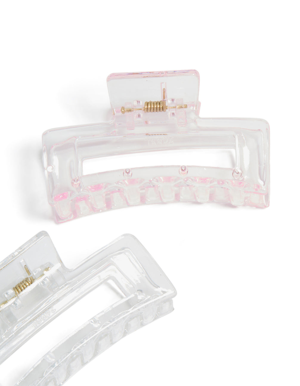 Designed with glitter 2-pack light pink and gold small rectangle claw clips side view