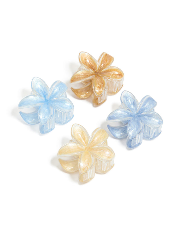 Featuring light brown and blue clear edge frangipani claw clips in a 4-pack with floral glitter accents in tan, peachpuff, and powder colors front view
