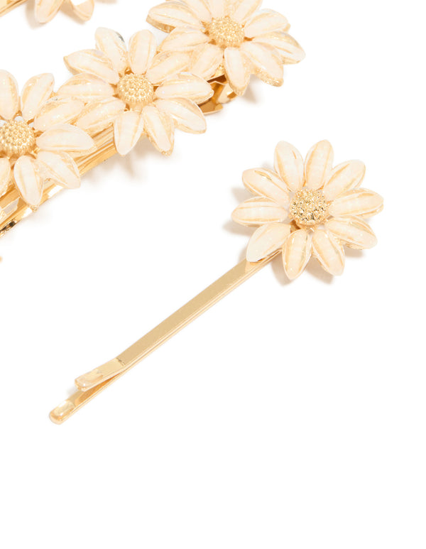 Discover gold detailed flowers hair clips in a 3-pack detail view