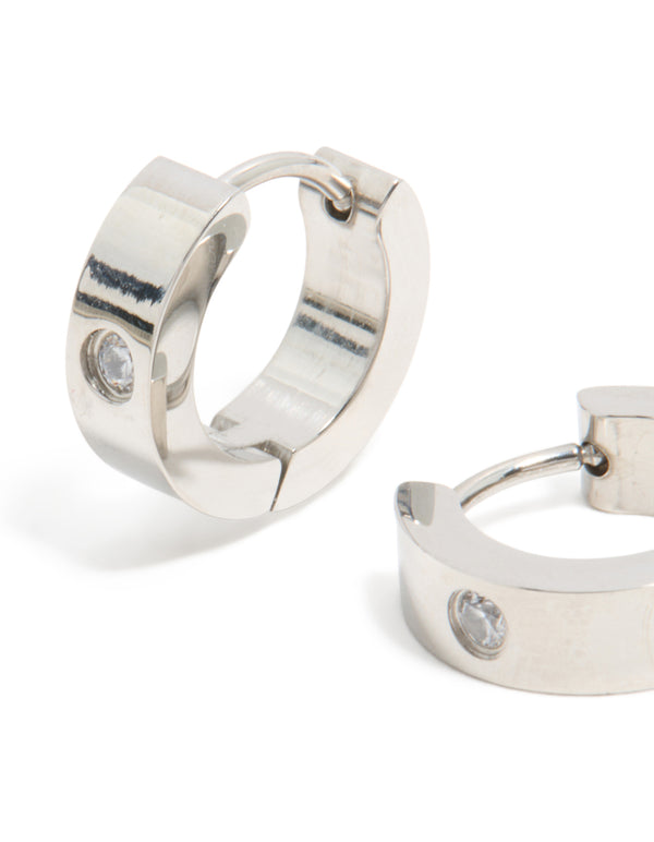 Finely designed are these mens waterproof stainless steel cubic zirconia huggie earrings close up view