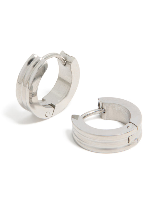 Featuring mens waterproof stainless steel ribbed huggie earrings in silver front view
