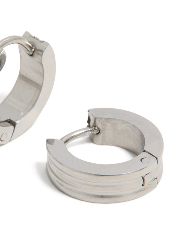 Presenting mens waterproof stainless steel ribbed huggie earrings in silver post detail view