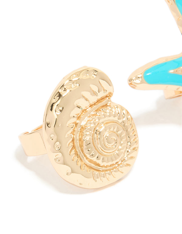 Showcasing gold light blue enamel and sea life rings in a 3-pack featuring animal ocean charm shell statement design detail