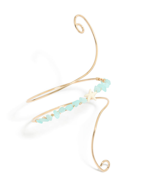 Introducing a gold turquoise semi precious stones arm cuff with beads and ocean-inspired starfish in statement style in front view