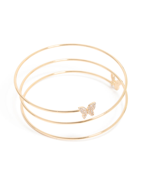 Showcasing a gold layered butterfly arm cuff in statement style front view