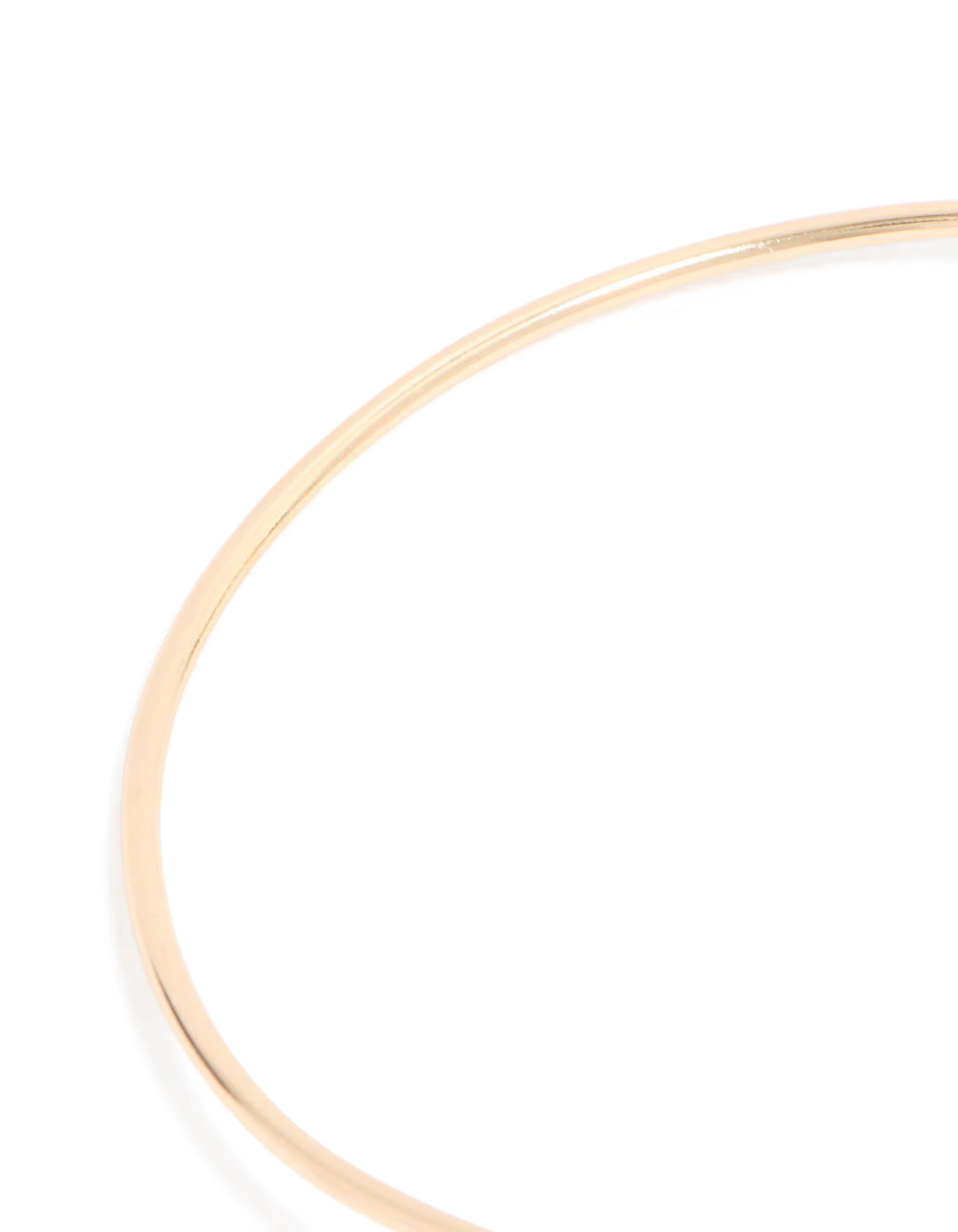 Featuring a gold celestial arm cuff with chain drop detail close up view