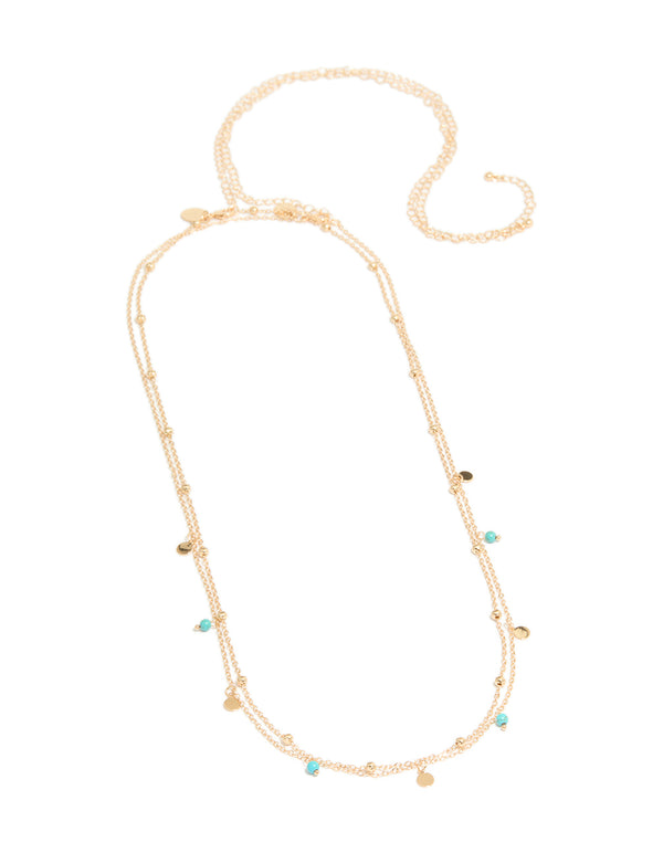 Beautifully designed waist chain with turquoise beads, gold ball, charms and embellished layered front view