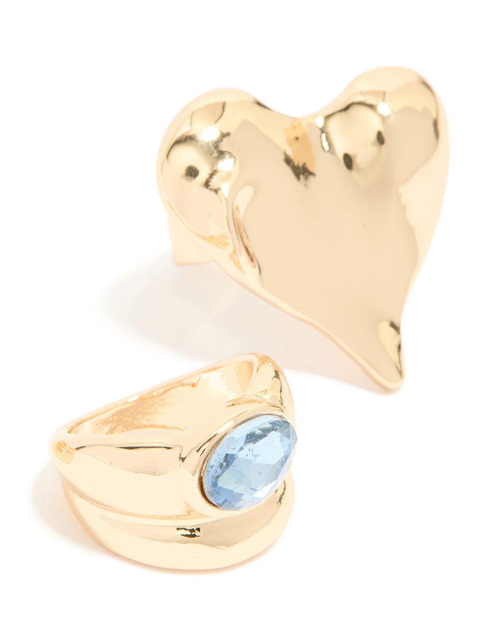 A closer look at the gold blue gem and heart 3-pack rings close up view