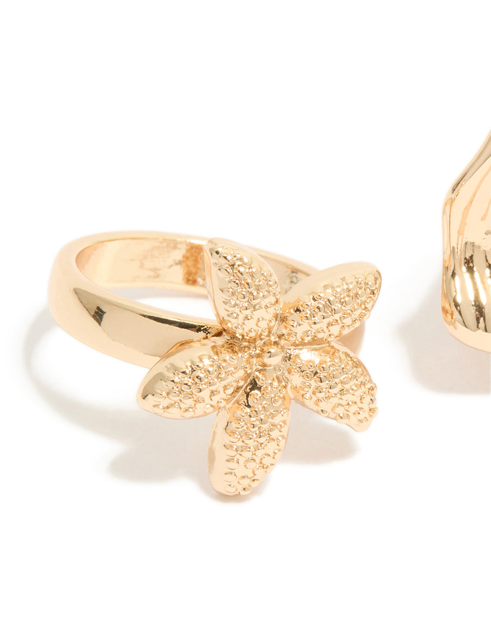 Featuring gold textured starfish and shell rings 3-pack with ocean charm pearl statement styling detail view