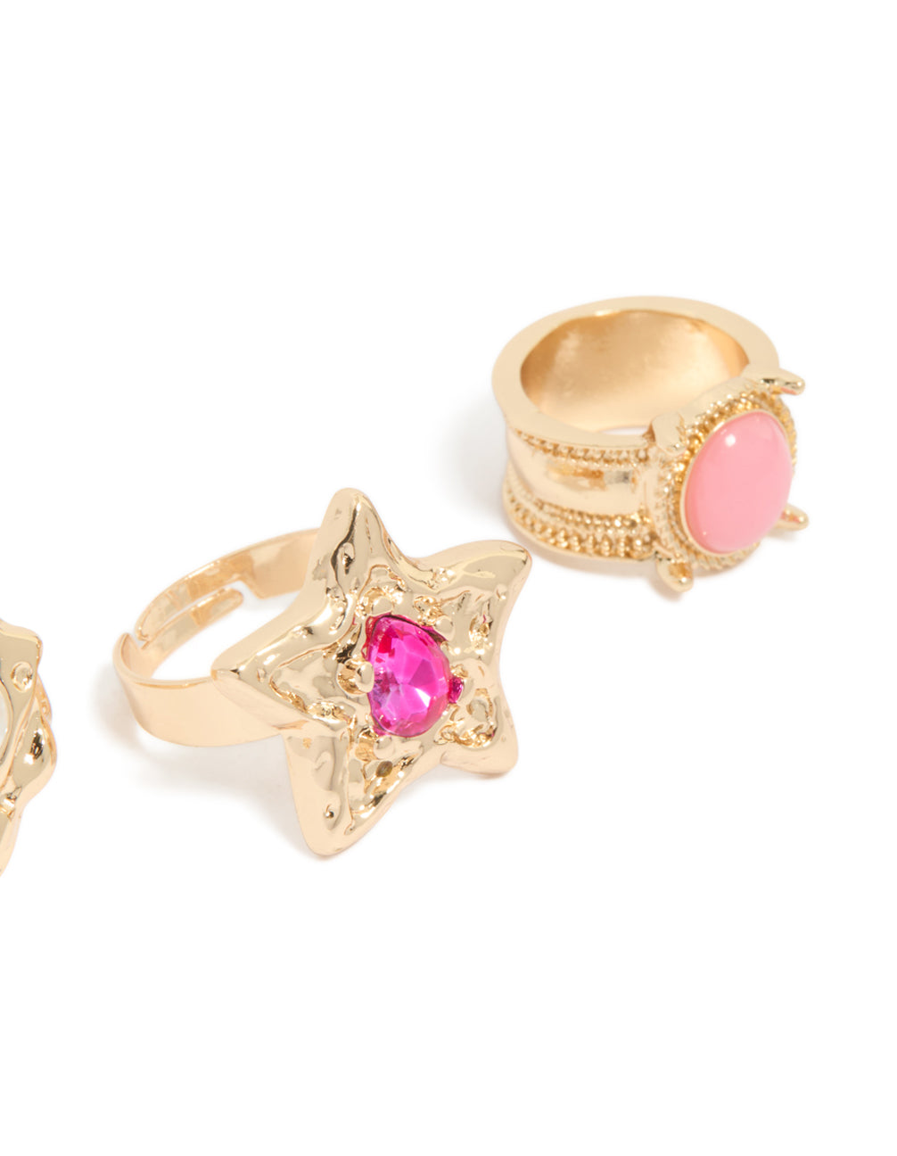 Crafted from gold with pearl and celestial star accents in pink, fuchsia, and white tones close up view