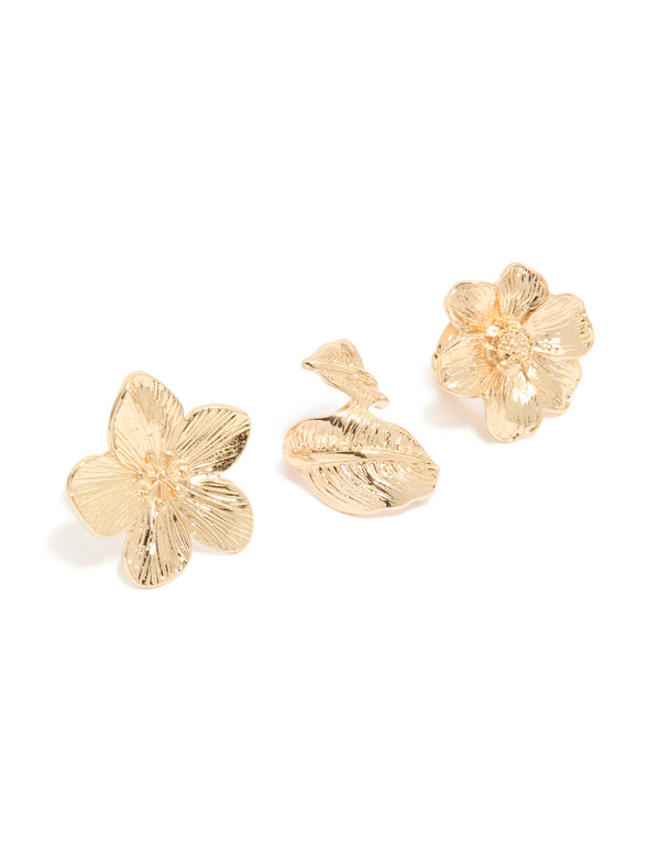 Crafted in gold, this flower rings 3-pack features floral and leaf pattern front view