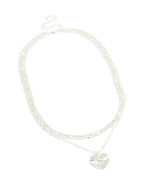 Featuring a silver plated chain and diamante heart layered necklace front view