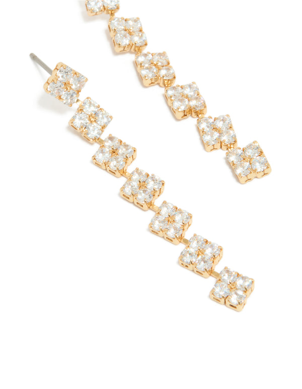 Highlighting gold plated cubic zirconia multi flower drop earrings with floral pattern close up view