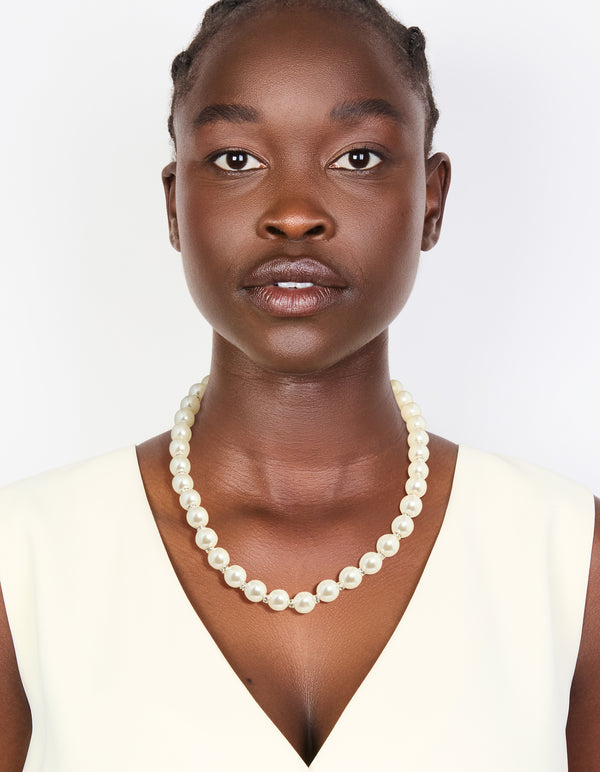 Beautiful silver plated diamante and pearl necklace with ivory beads on model view