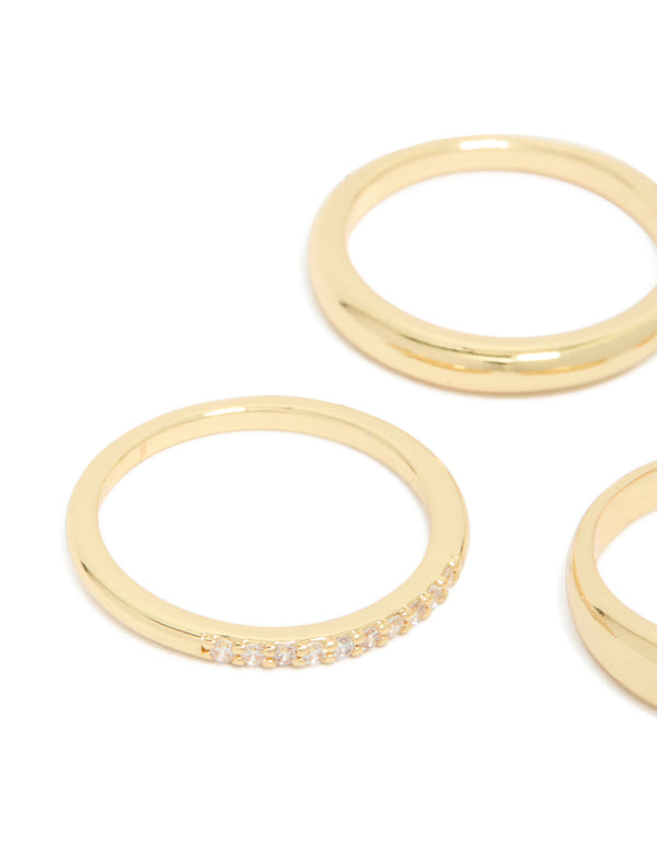 Featuring gold plated cubic zirconia and plain rings 4-pack with crystal accents in stackable chunky design close up view