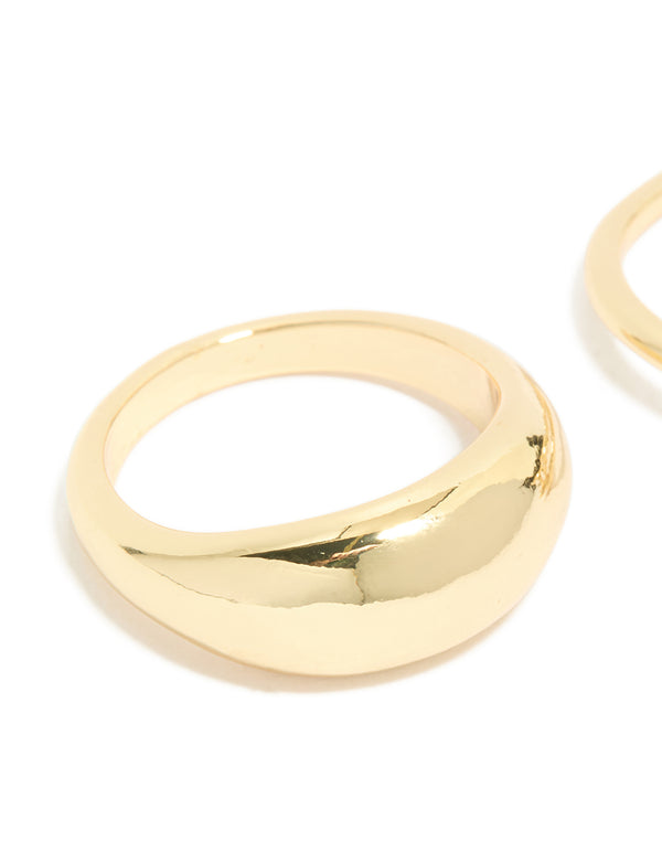 Crafted from gold plated materials, cubic zirconia and crystal chunky statement rings in a 3-pack with oval stone cut close up view