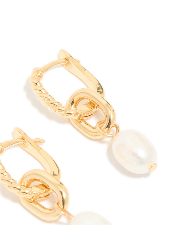 Featuring gold plated textured freshwater pearl drop huggie earrings with hoop closure post detail view