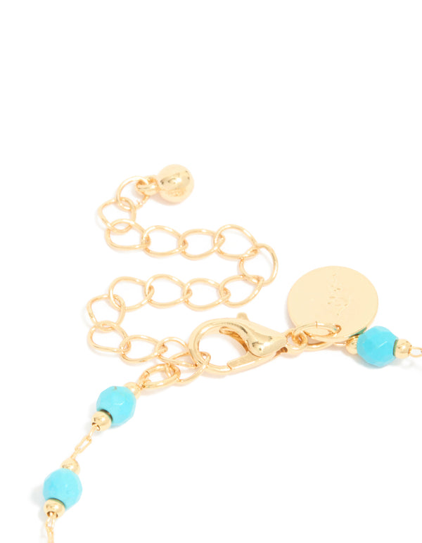 Crafted gold plated turquoise semi precious stone bracelet closure detail view