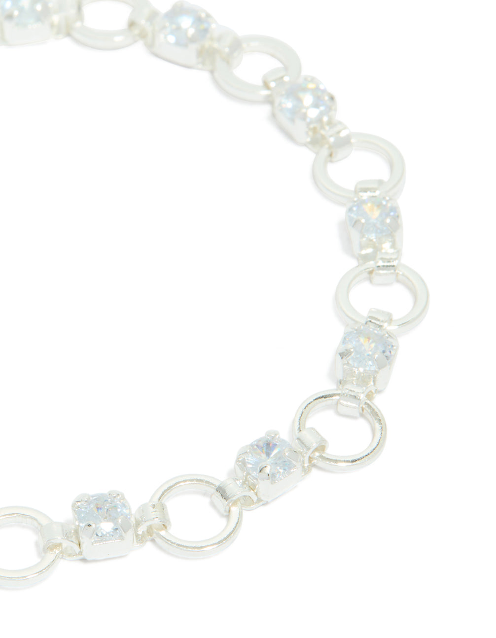 Beautifully crafted silver plated alternating cubic zirconia round link bracelet featuring round stone cut close up view