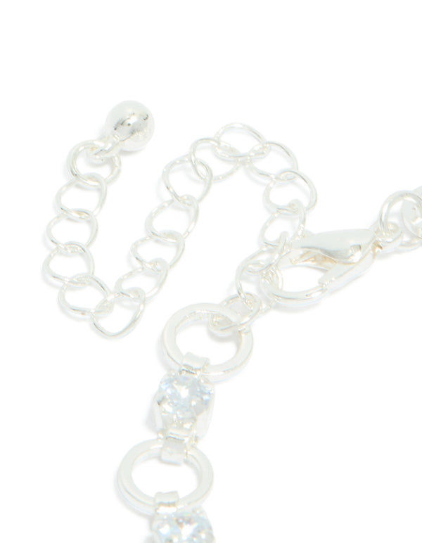 Discover the silver plated alternating cubic zirconia round link bracelet with round stone cut closure detail view