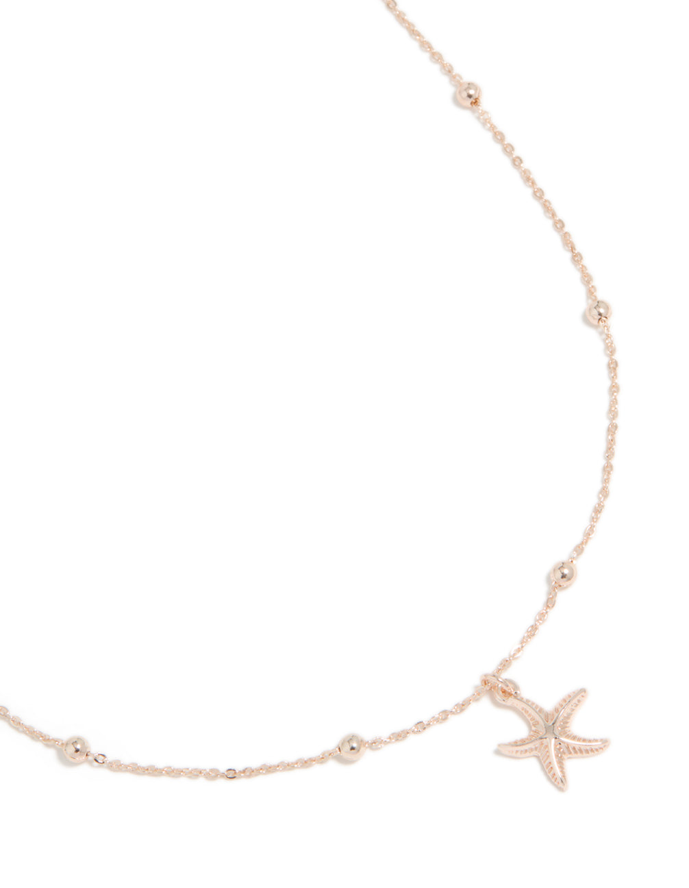 Beautifully crafted rose gold starfish pendant necklace featuring balls and ocean-inspired elements close up view