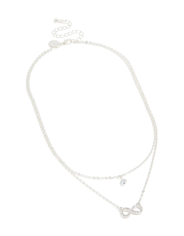 Showcasing a diamante with infinity pendant in layered silver necklace front view