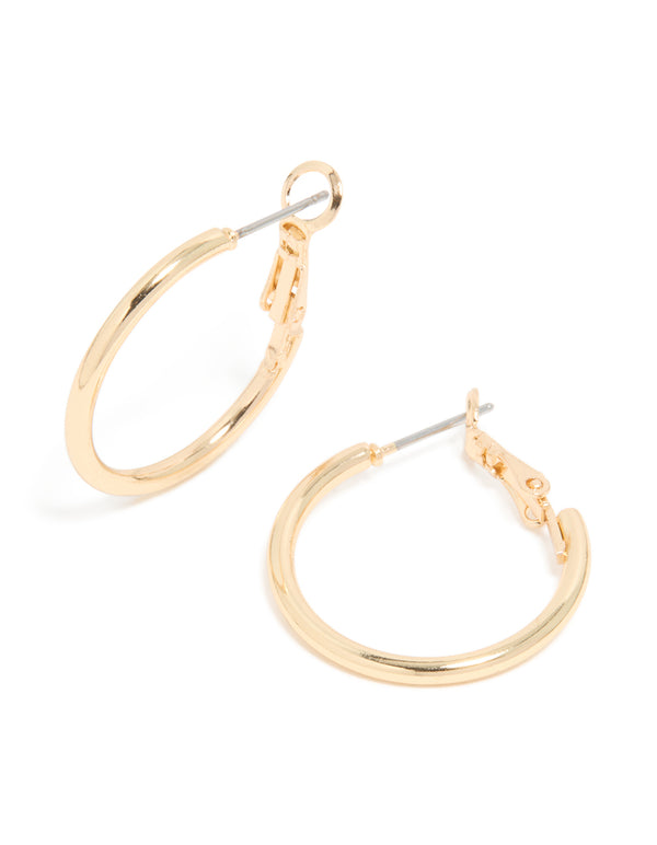 Showcasing gold smooth hoop earrings with closure front view