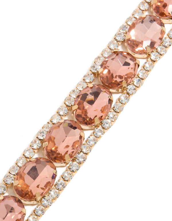 Featuring a silver pink and clear diamantes bracelet in a close up view