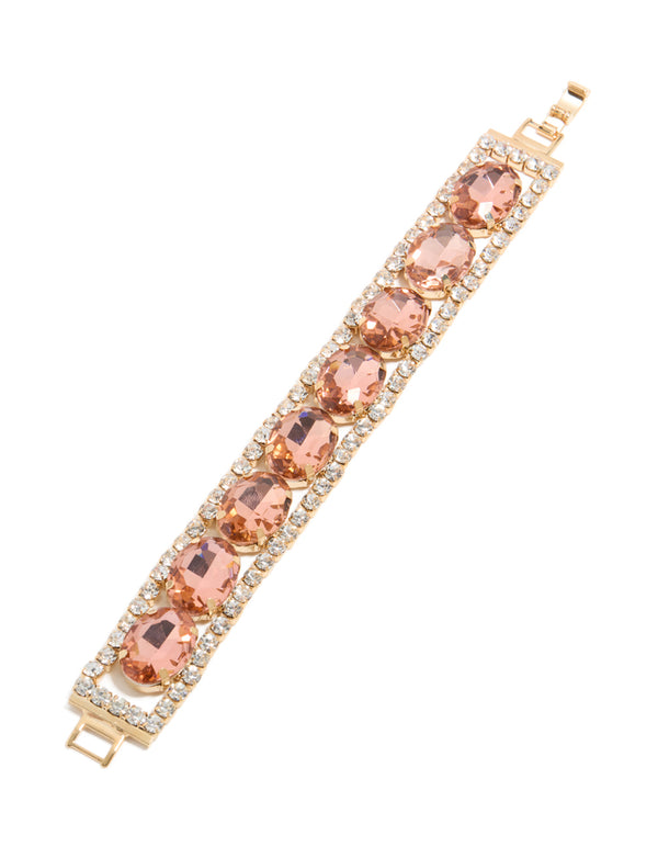 Presenting a silver pink and clear diamantes bracelet accents front view