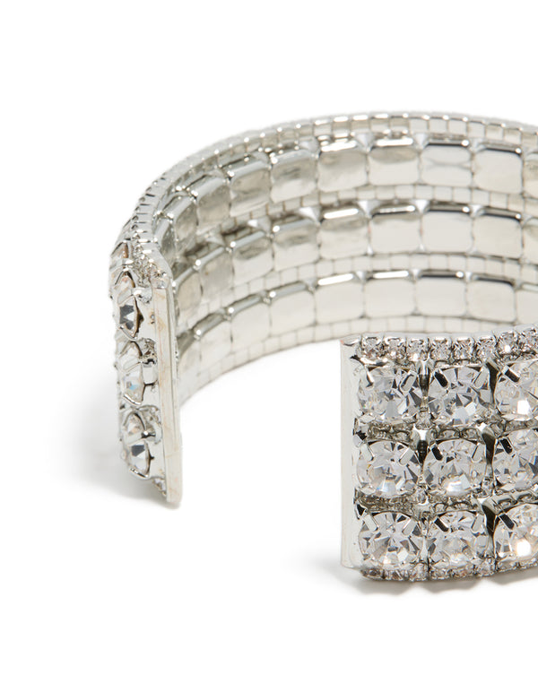 Highlighting the radiant diamante embellished large statement wrist cuff bangle in silver with detailed closure detail view