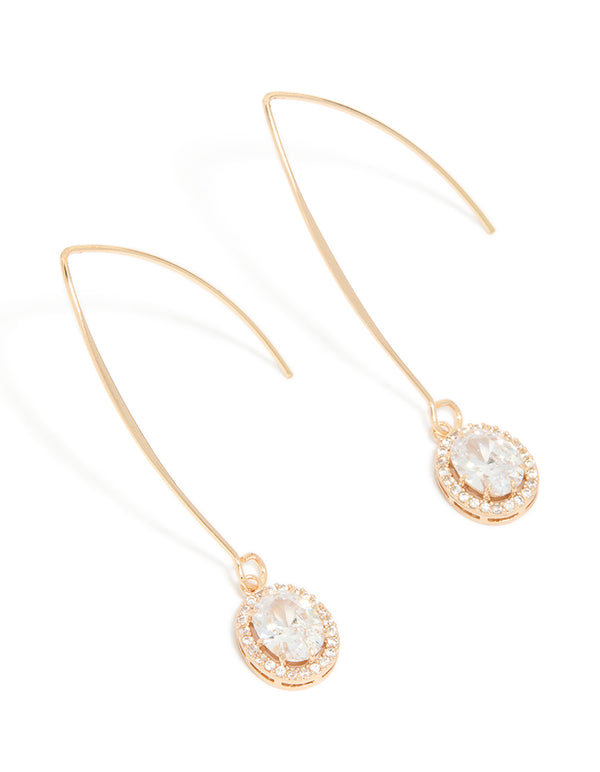 Crafted from cubic zirconia, these gold dainty circle drop earrings feature a front view